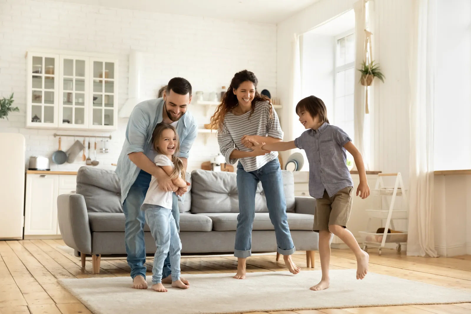 Family dancing in living room 1600