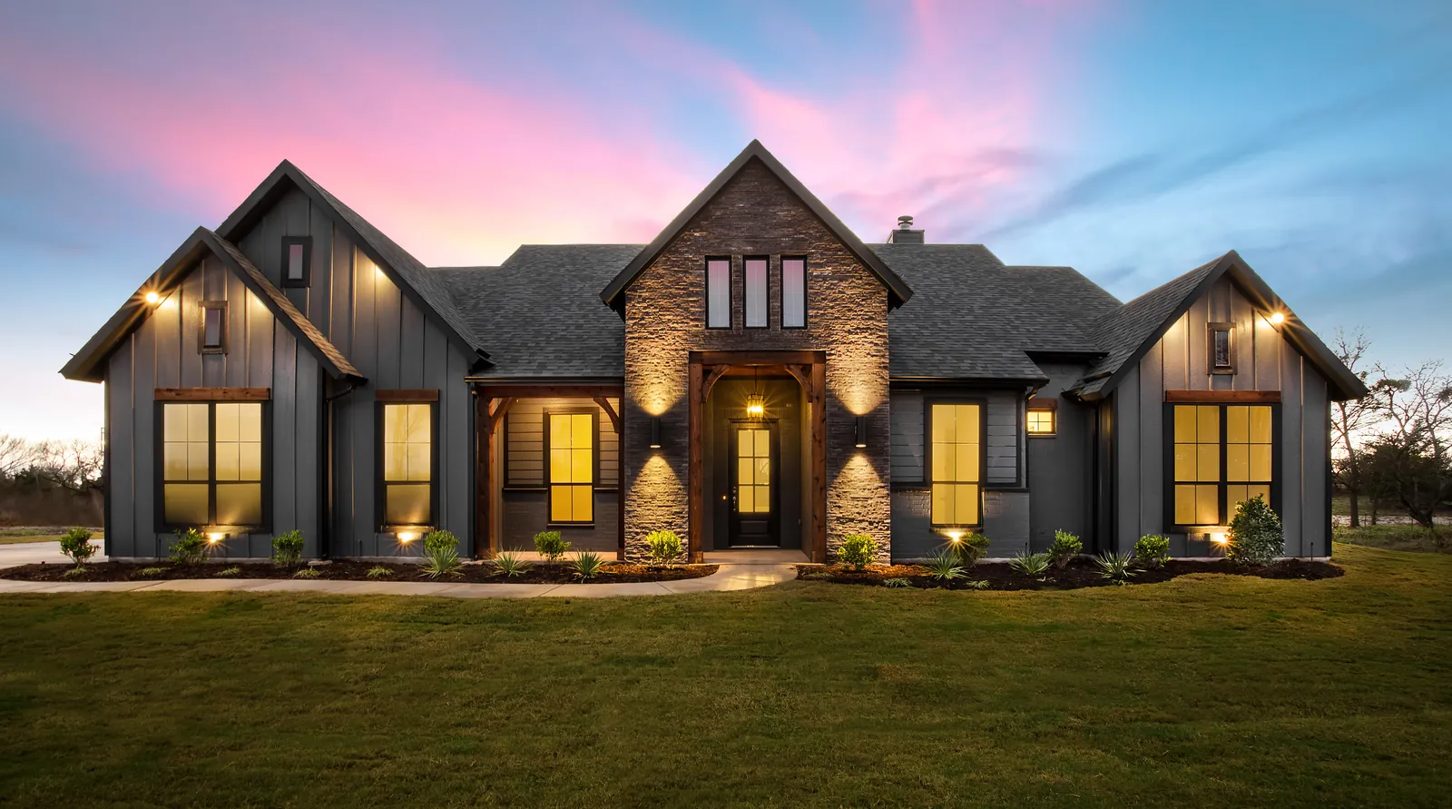 Modern farmhouse exterior dusk lighting 1600